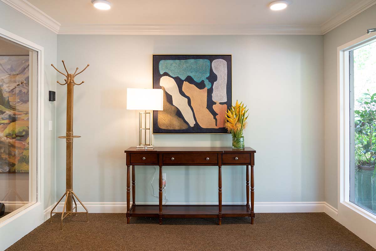 sunrise-redmond-senior-living-remodel-entry-way Sunrise senior living facility remodel tv area