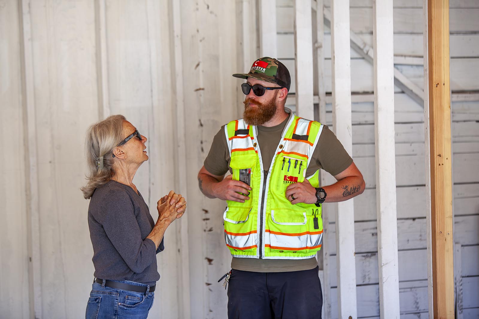 worker-with-client Mrs Bock with Charter construction worker